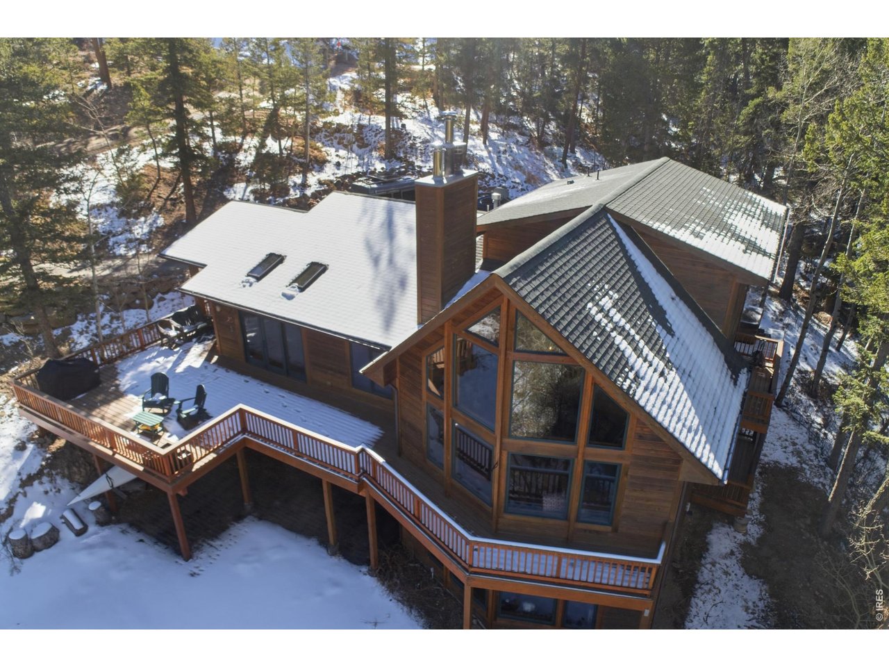 4079 Little Valley Road Estes Park, CO 80517 - Photo 36 of 39 a view of a house with a roof deck