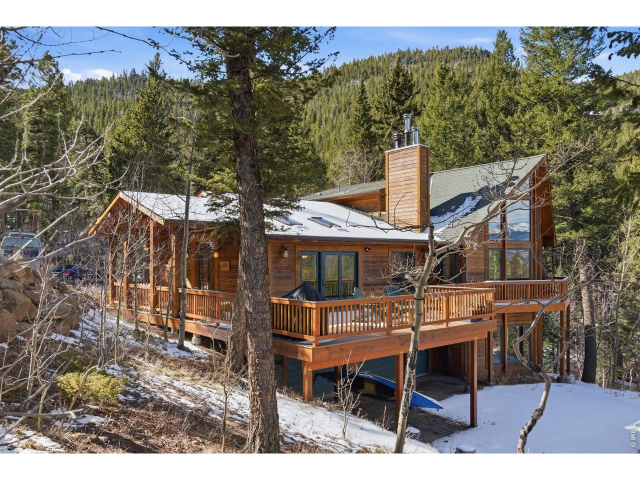 4079 Little Valley Road Estes Park, CO 80517 - Photo 37 of 39 a small house with a outdoor space
