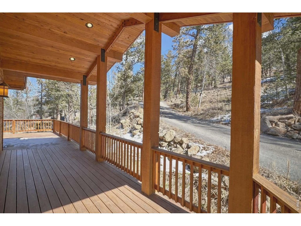 4079 Little Valley Road Estes Park, CO 80517 - Photo 4 of 39 a view of a wooden deck