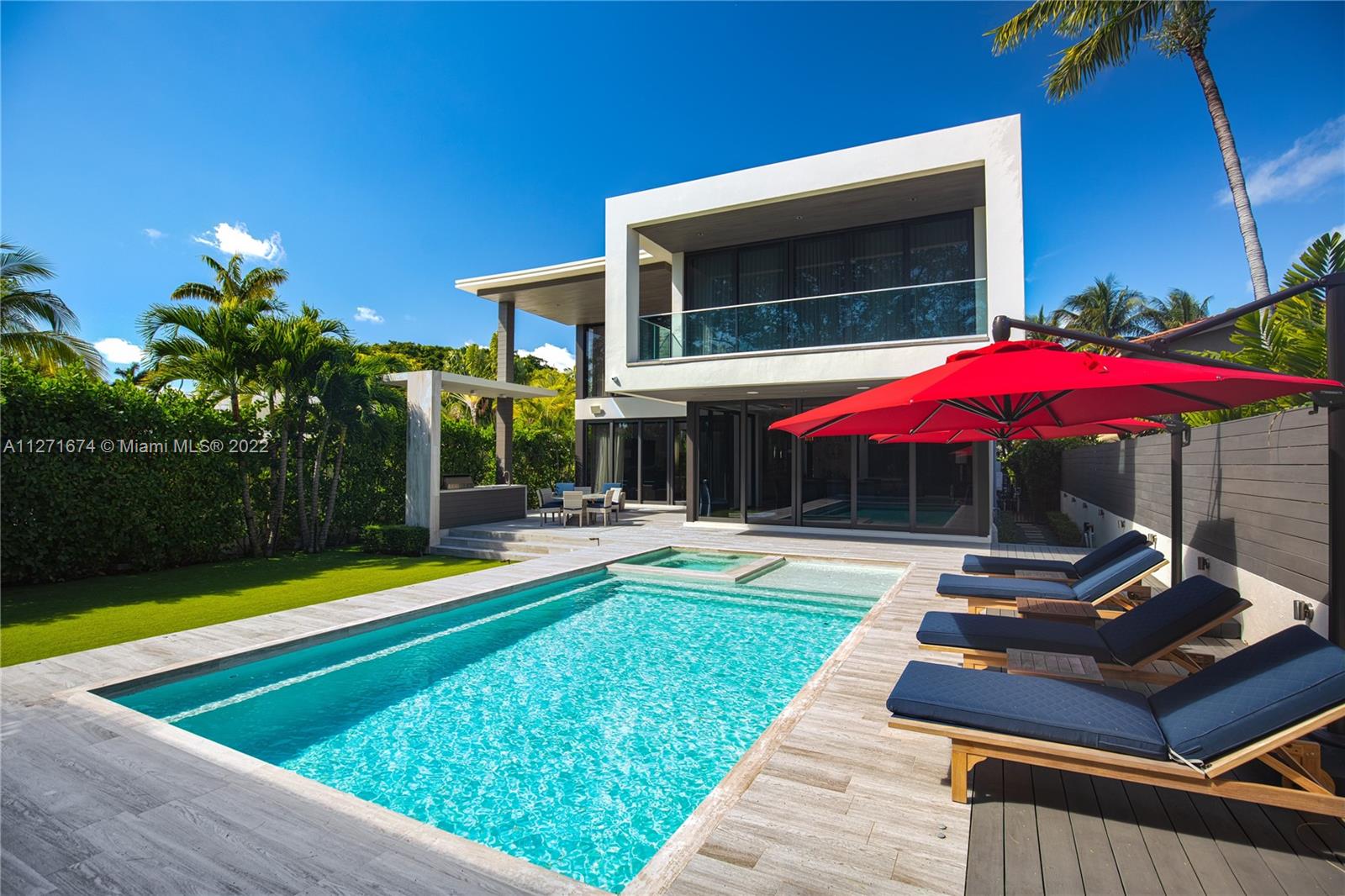 5061 North Bay Road Miami Beach, FL 33140 - Photo 4 of 23 a view of swimming pool with a patio