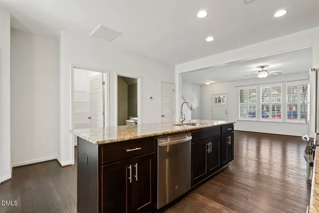 a large bathroom with a large counter top and sink