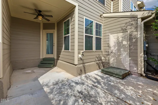 a view of a building with sitting area