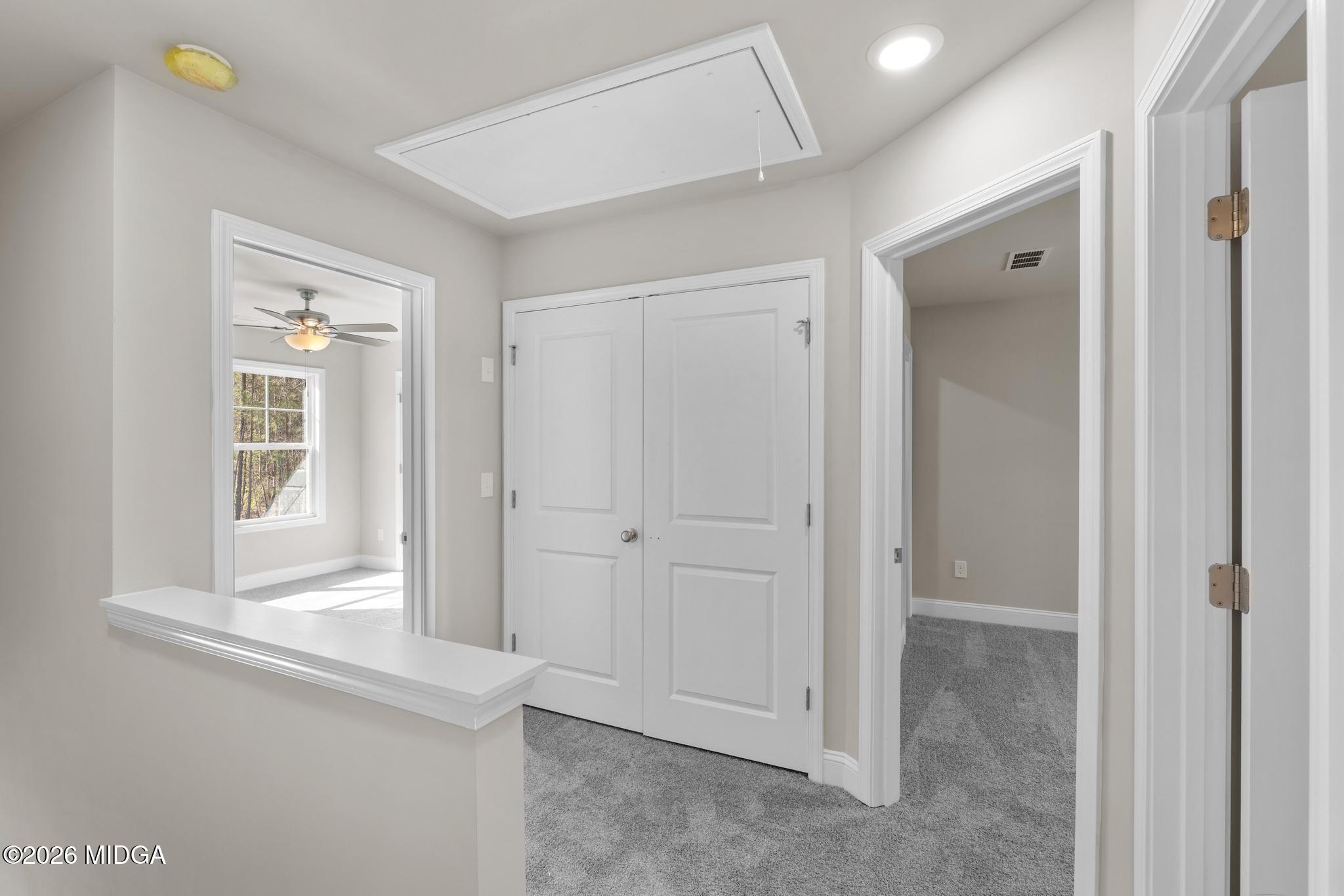 220 Welsh Trail Macon, GA 31216 - Photo 17 of 30 an empty room with windows and closet