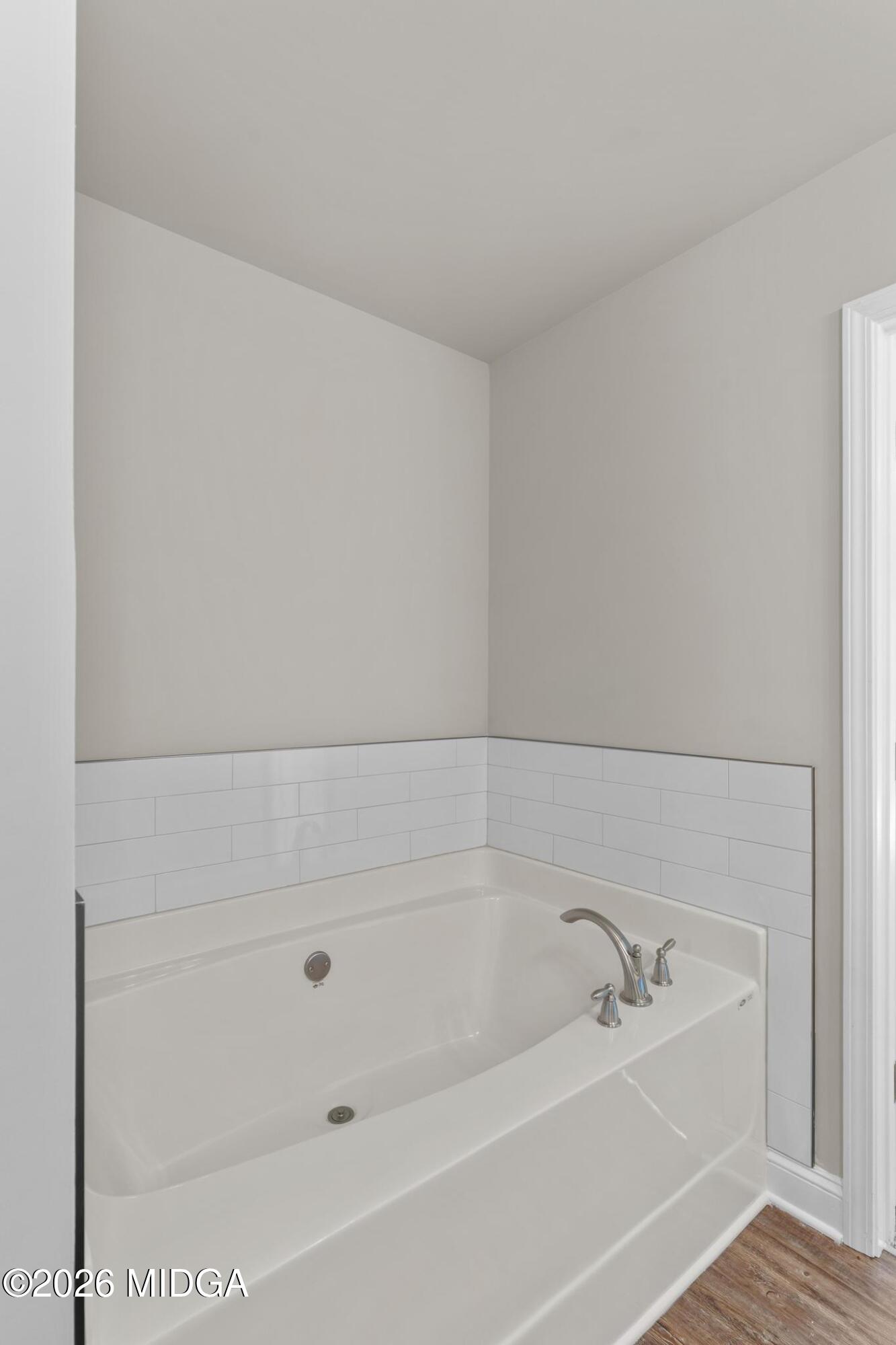 220 Welsh Trail Macon, GA 31216 - Photo 20 of 30 a bathroom with a bathtub