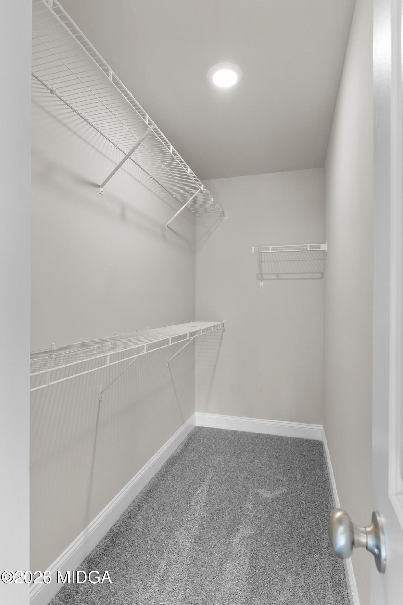 220 Welsh Trail Macon, GA 31216 - Photo 28 of 30 a view of a room with racks on the wall