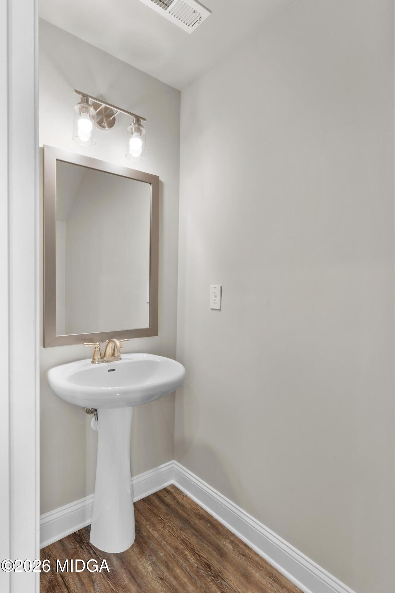 220 Welsh Trail Macon, GA 31216 - Photo 29 of 30 a bathroom with a sink and a mirror