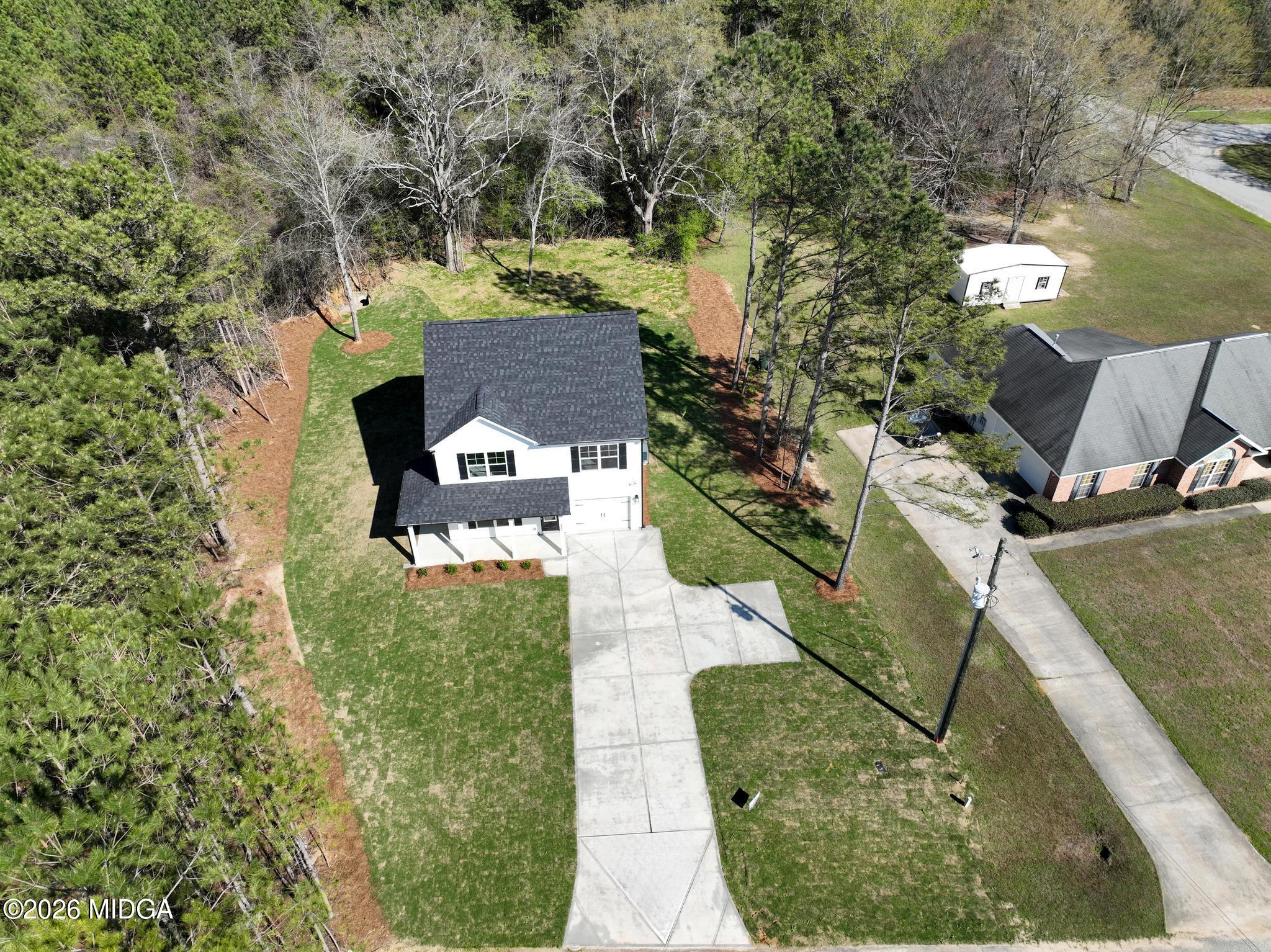 220 Welsh Trail Macon, GA 31216 - Photo 6 of 30 an aerial view of a house with swimming pool