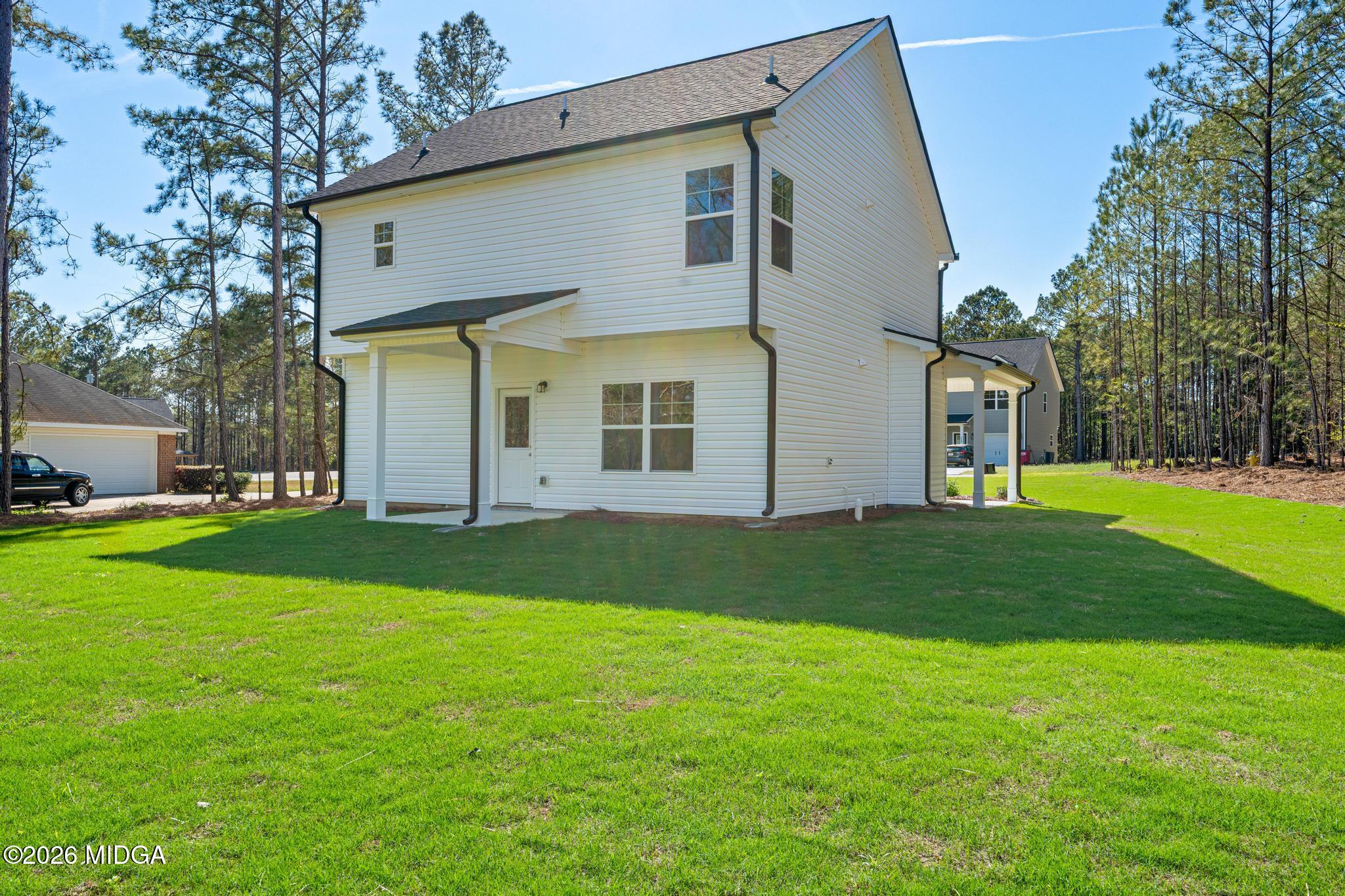 220 Welsh Trail Macon, GA 31216 - Photo 7 of 30 a front view of house with yard and green space