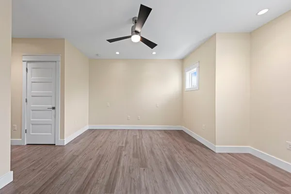 a bathroom with a shower and a toilet