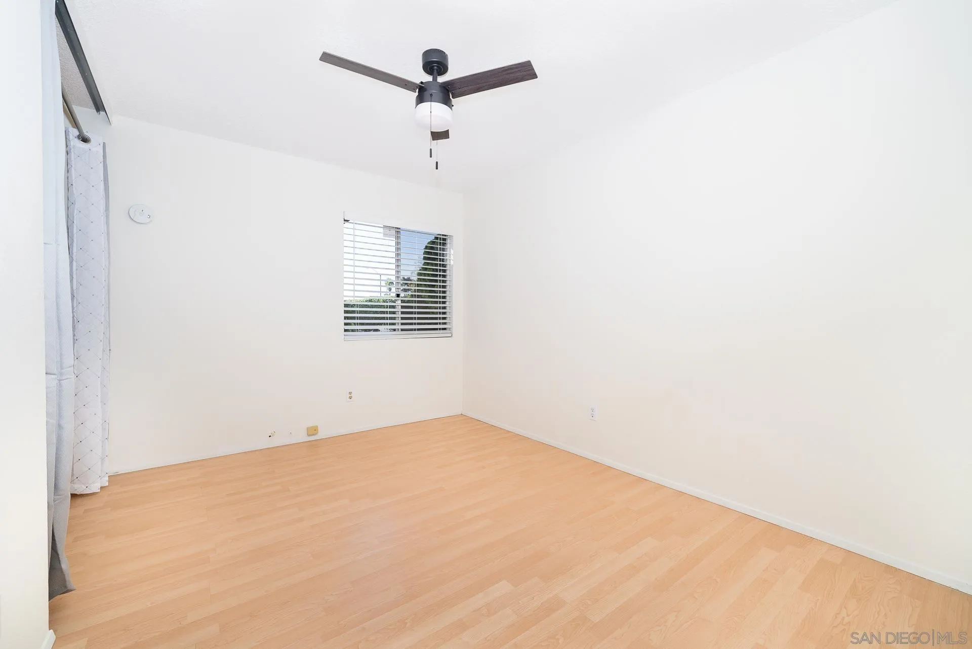 10134 Princess Joann Road Santee, CA 92071 - Photo 16 of 29 a view of an empty room with a window