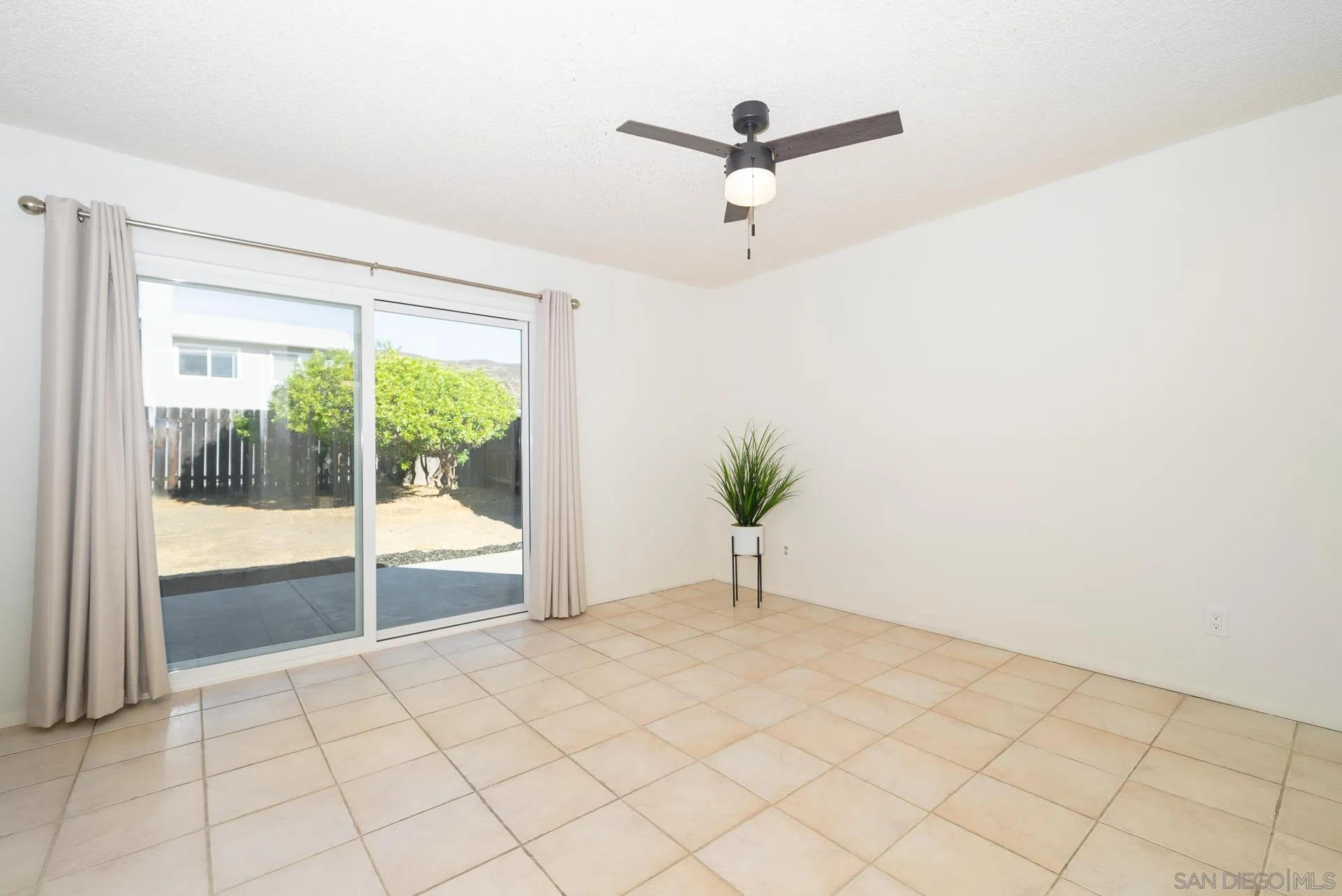 10134 Princess Joann Road Santee, CA 92071 - Photo 18 of 29 a view of an empty room and window