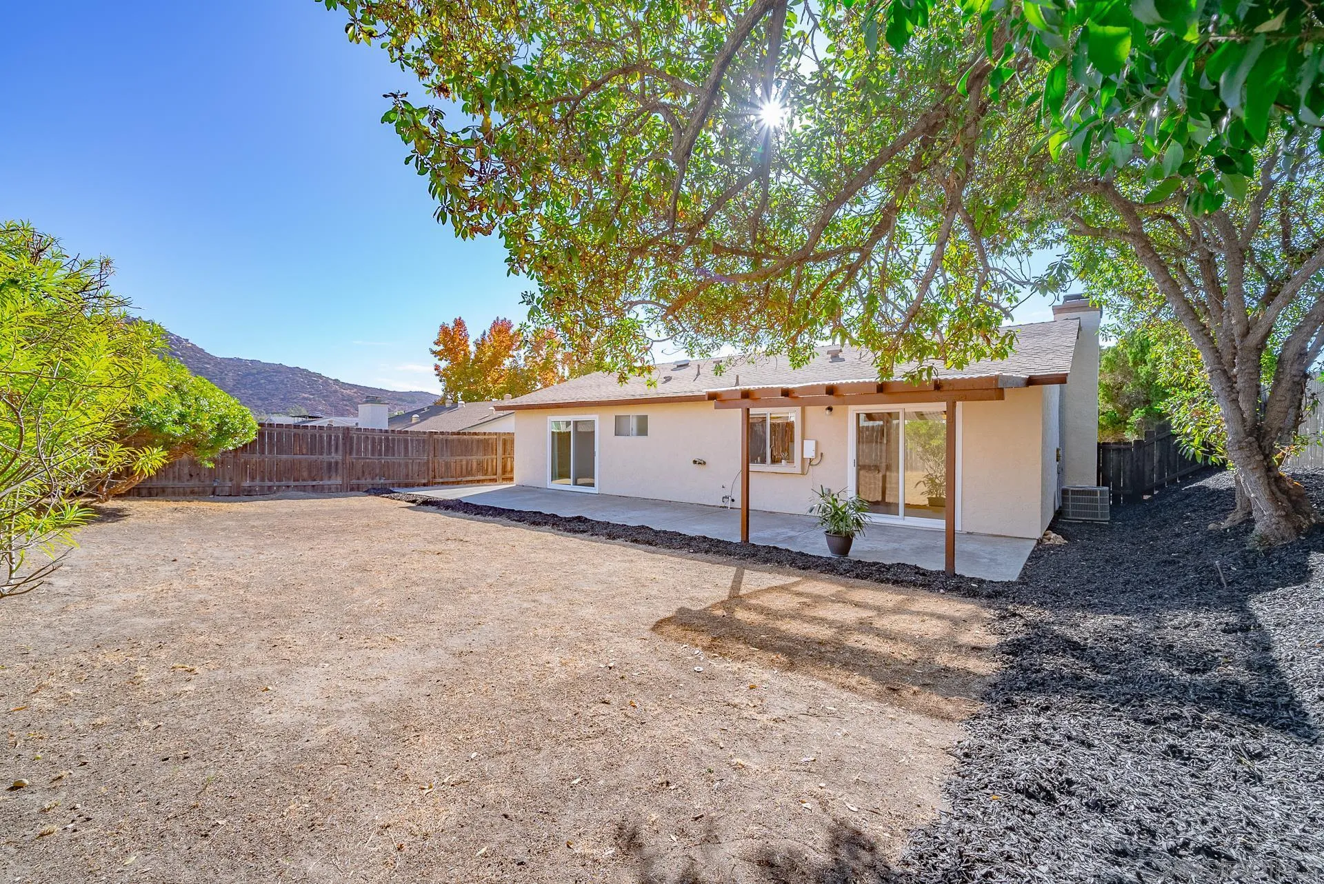 10134 Princess Joann Road Santee, CA 92071 - Photo 25 of 29 a house view with a backyard space