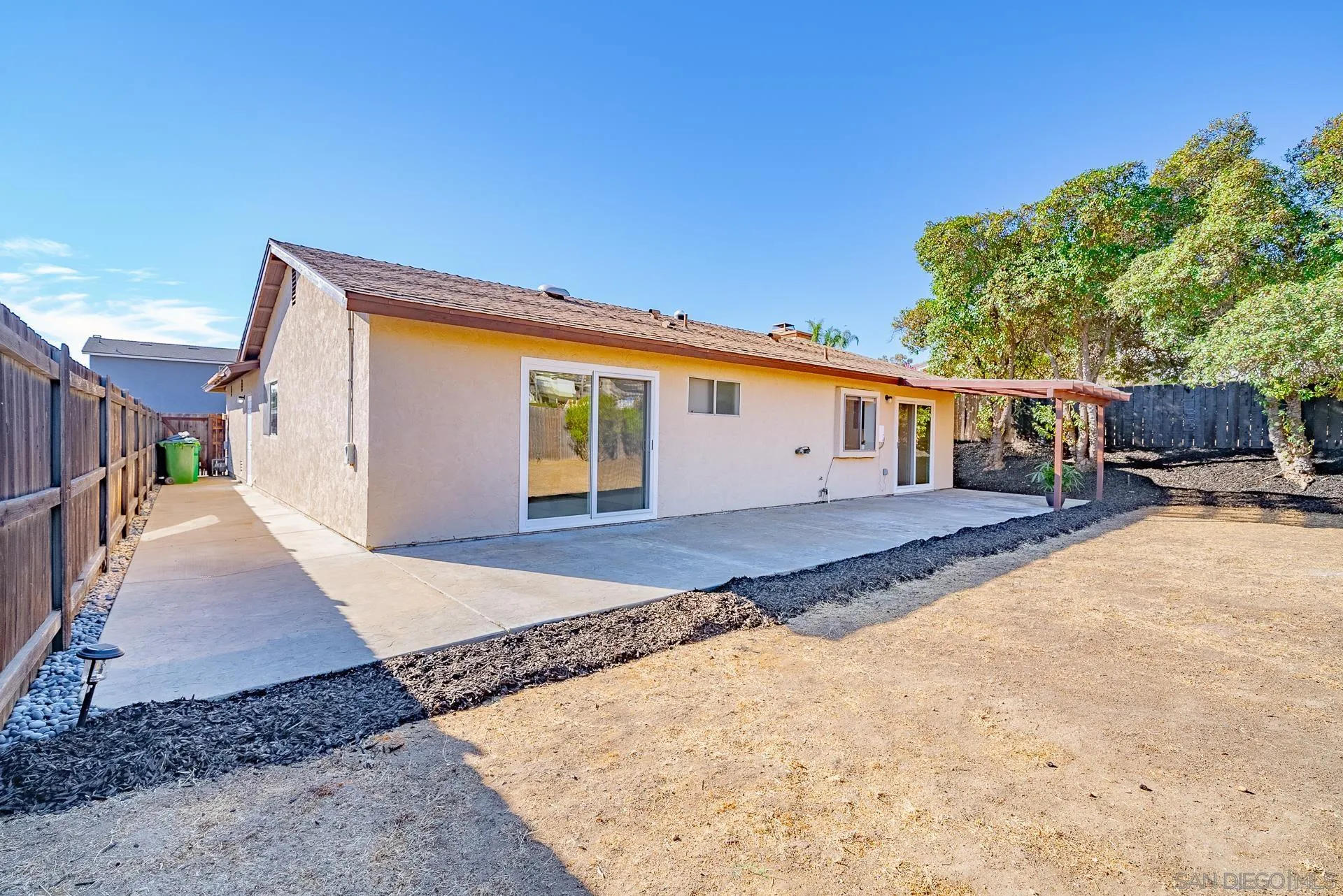 10134 Princess Joann Road Santee, CA 92071 - Photo 3 of 29 a view of a backyard with a patio