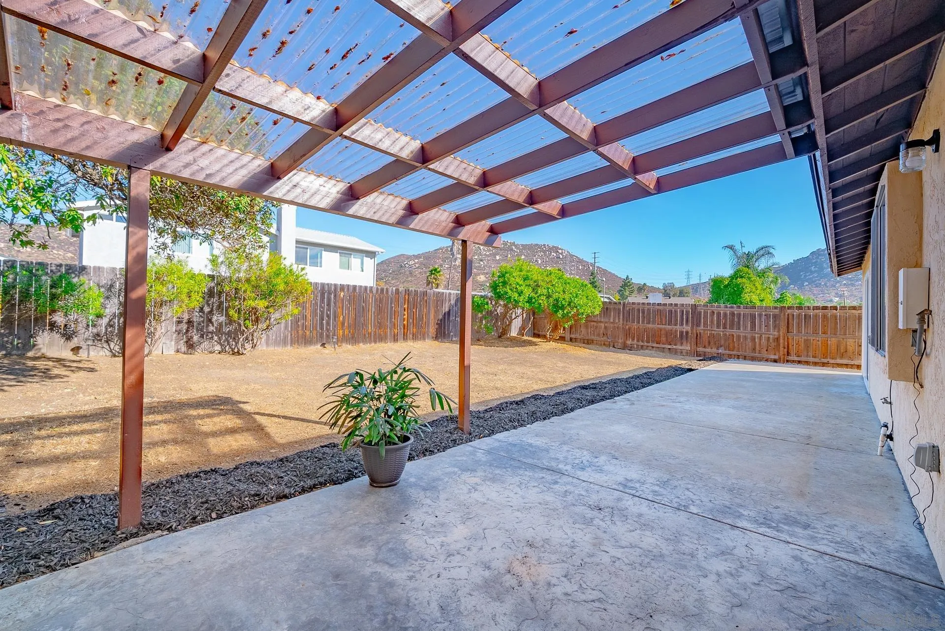 10134 Princess Joann Road Santee, CA 92071 - Photo 5 of 29 a view of a backyard