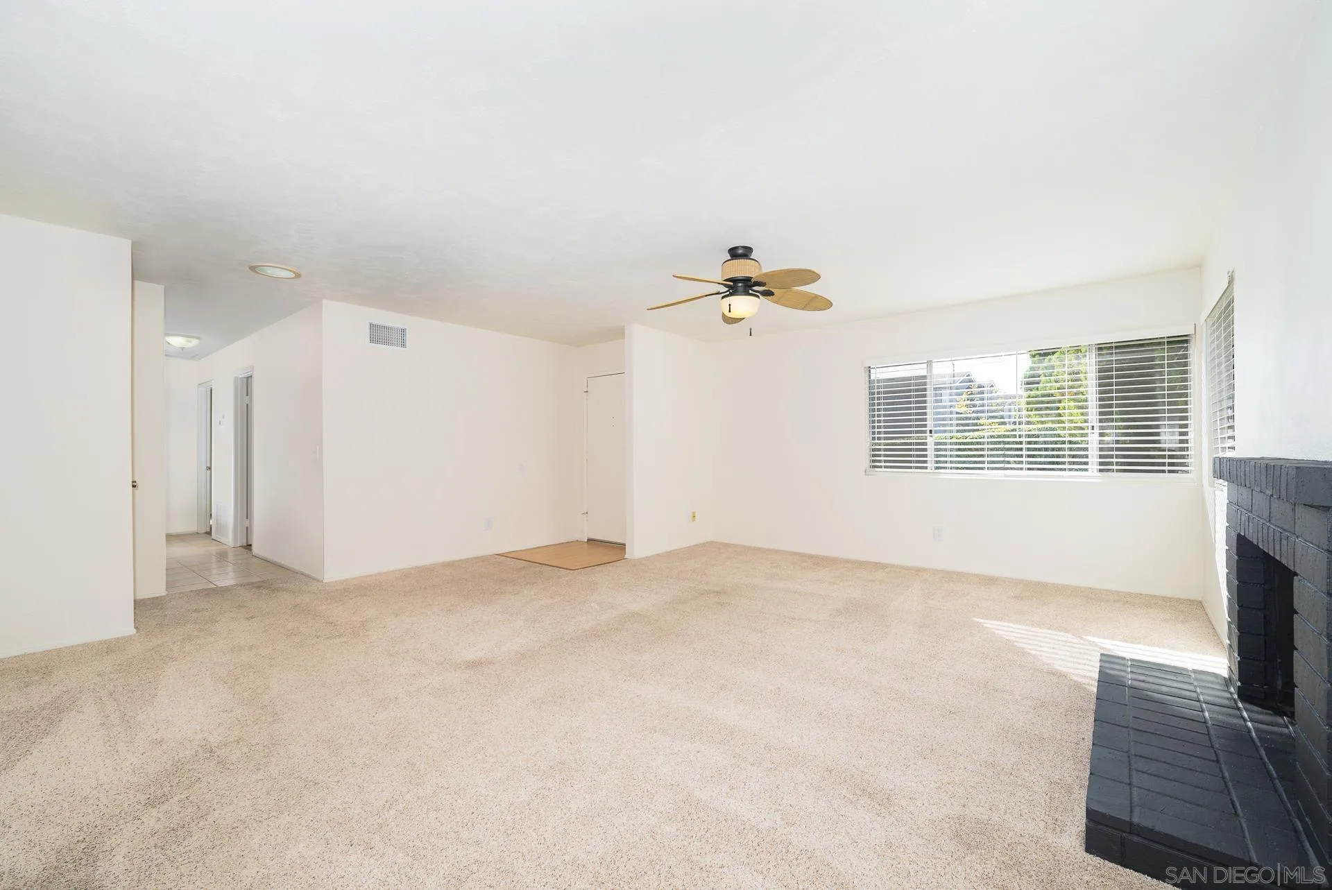 10134 Princess Joann Road Santee, CA 92071 - Photo 9 of 29 a view of an empty room with a window