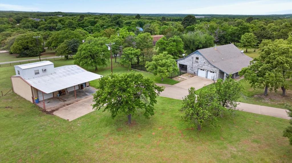 4609 Slayton Road Cleburne, TX 76031 - Photo 7 of 40 an aerial view of a house with a yard