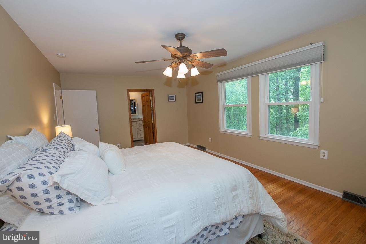 1471 Church Road Malvern, PA 19355 - Photo 41 of 73 OWNER'S BEDROOM WITH LIGHTED CEILING FAN