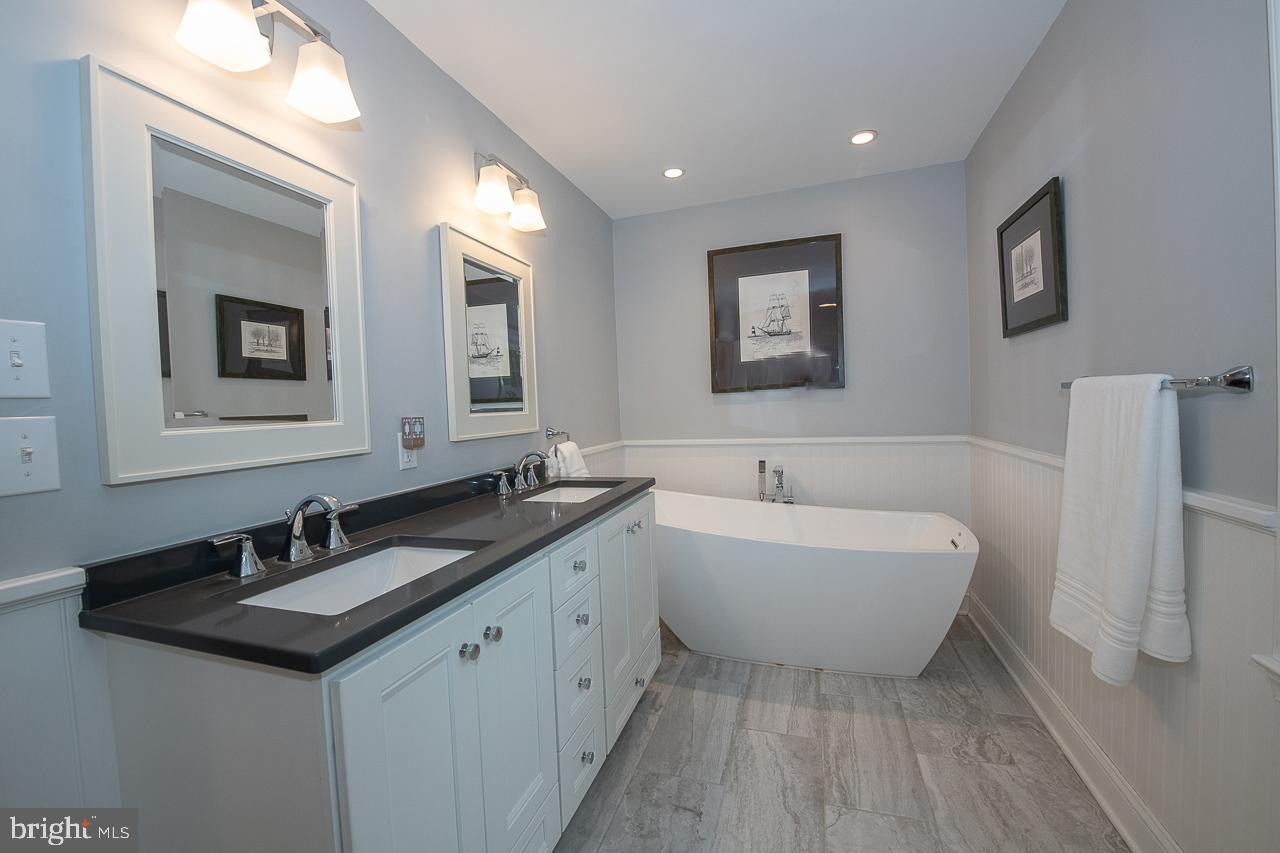 1471 Church Road Malvern, PA 19355 - Photo 50 of 73 2ND FLOOR HALL BATH WITH SOAKING TUB & DOUBLE SINK