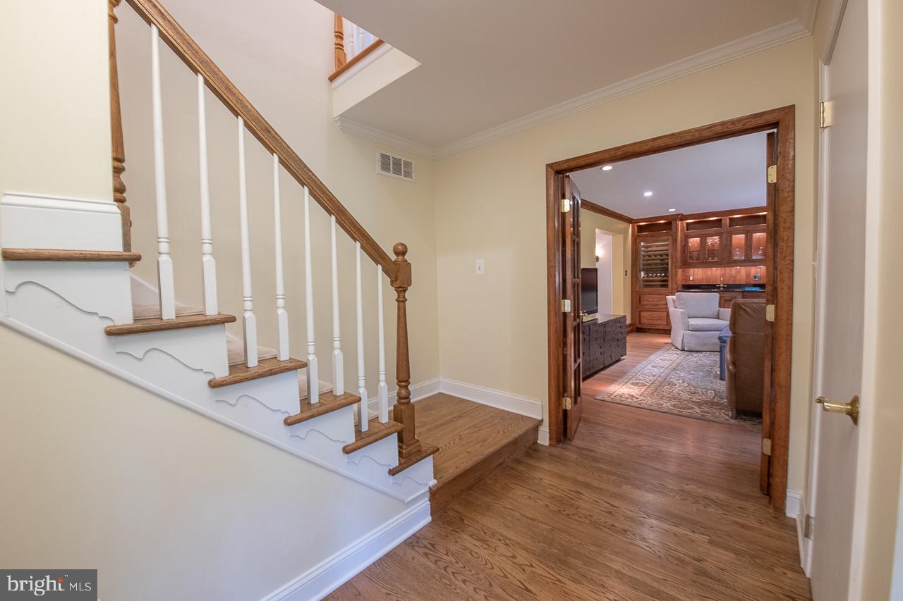 FOYER LOOKING INTO LIVING ROOM