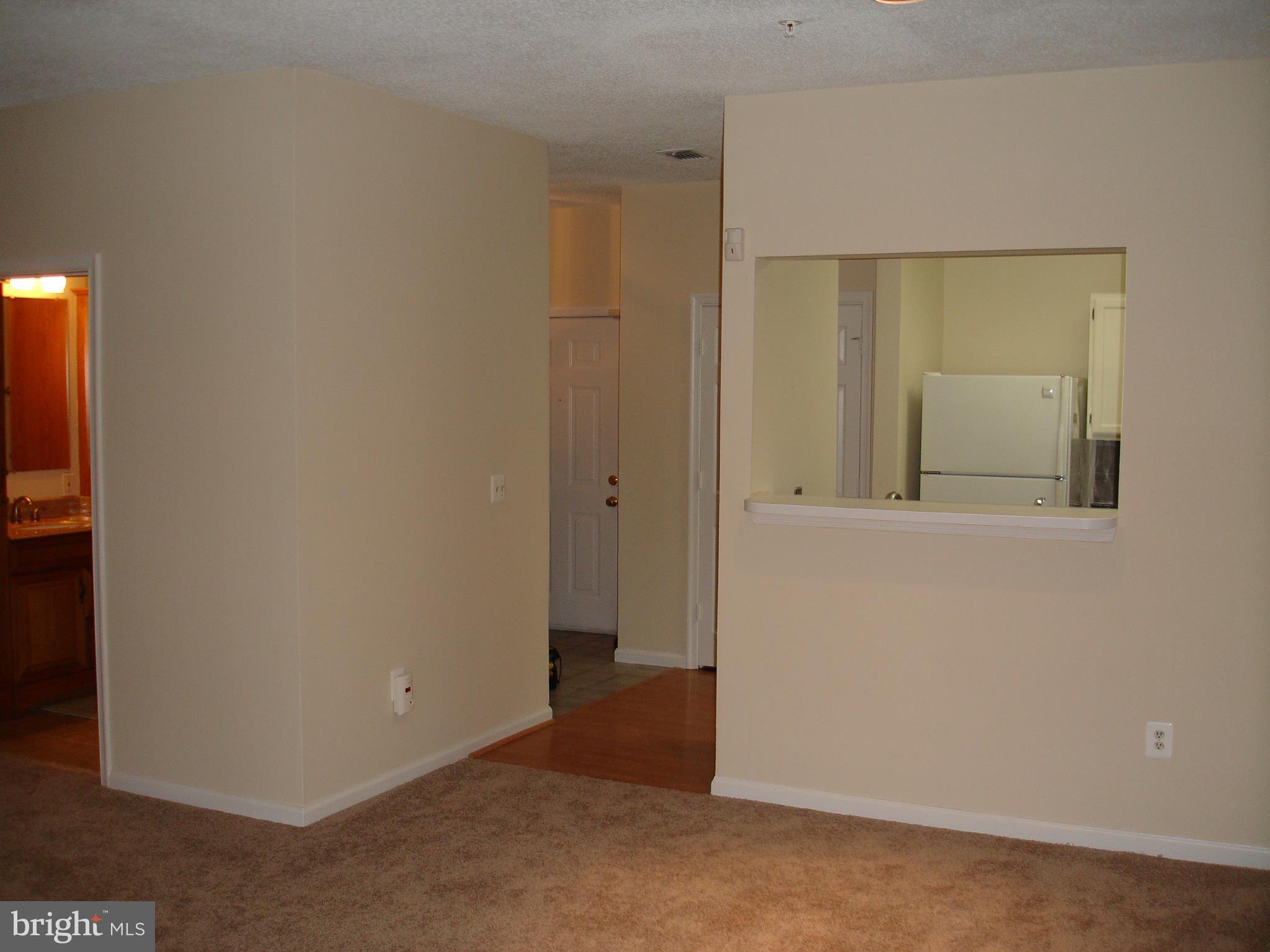 12013 Taliesin Place, Unit 14 Reston, VA 20190 - Photo 3 of 20 Kitchen Access / sitting space