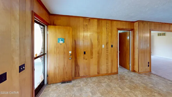 a bathroom with a tub and shower
