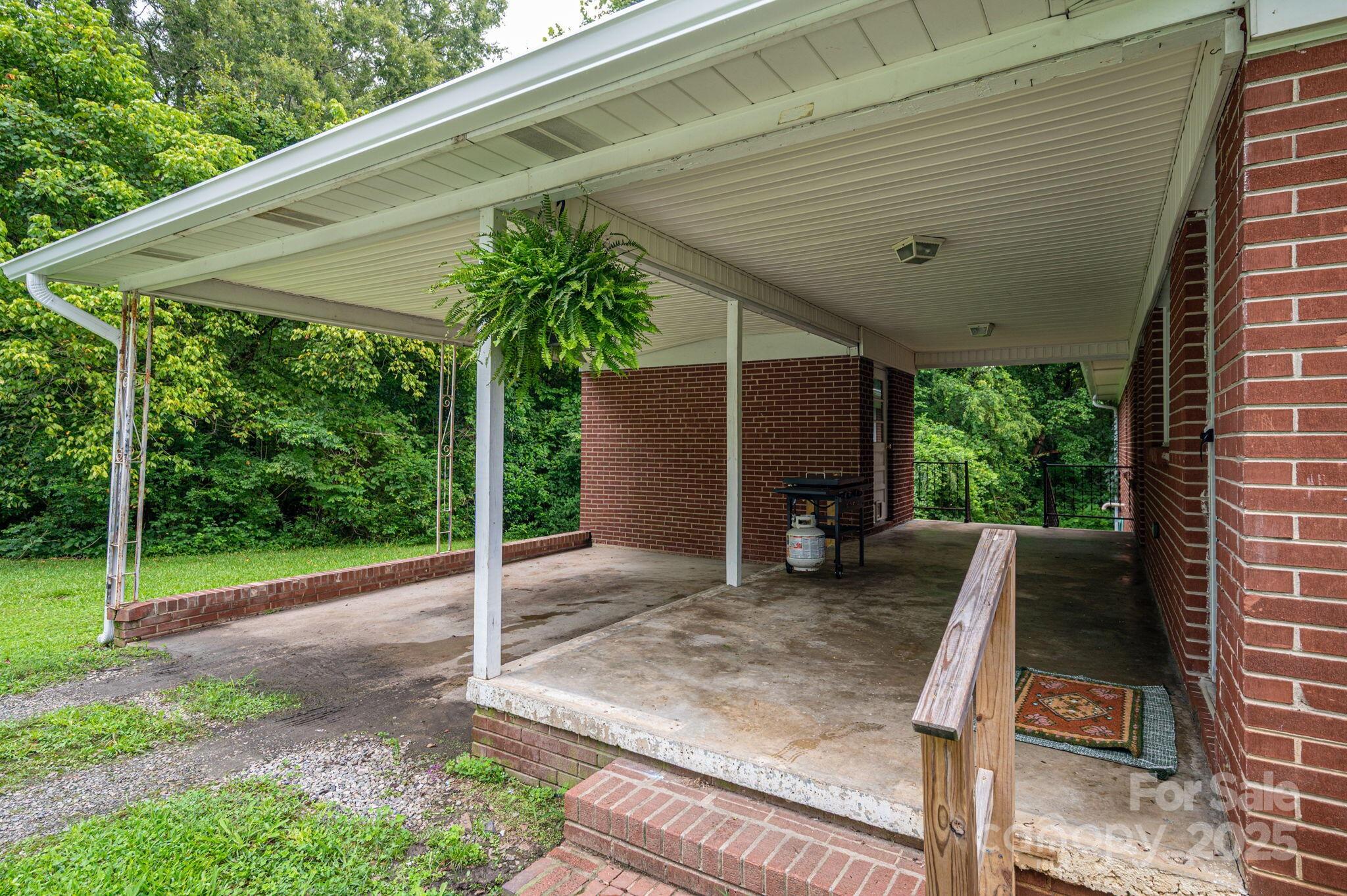26 Kee Road Belmont, NC 28012 - Photo 13 of 15 a view of a house with backyard and sitting area