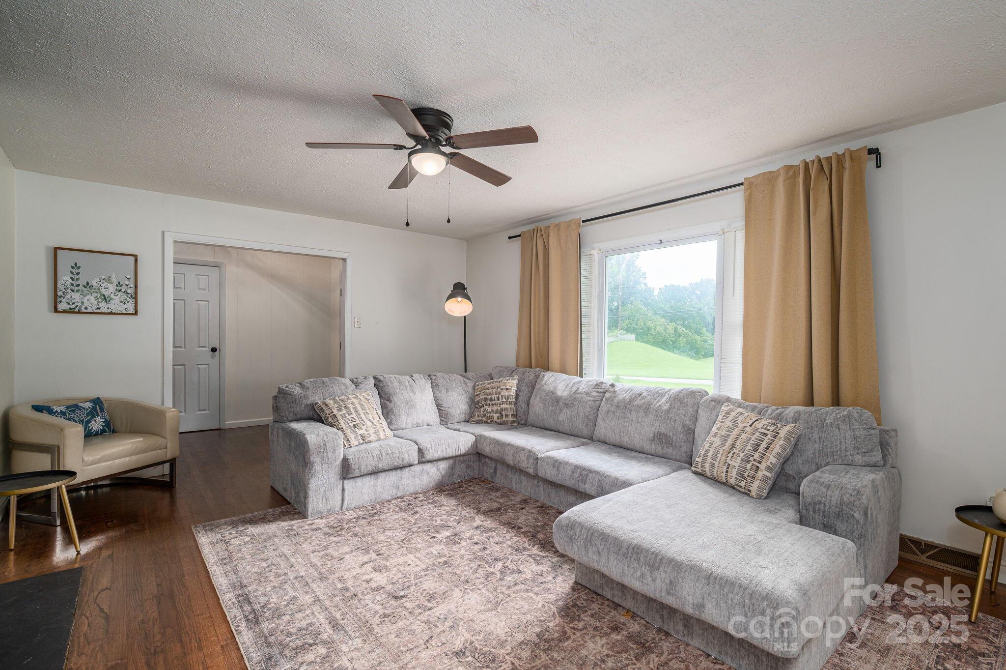 26 Kee Road Belmont, NC 28012 - Photo 6 of 15 a living room with furniture and a large window