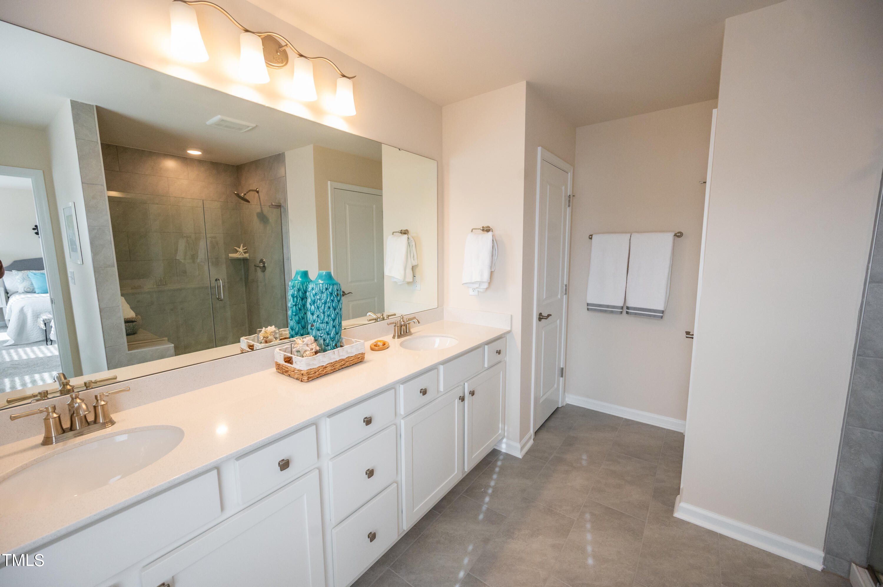 5716 Agrinio Way Raleigh, NC 27603 - Photo 15 of 25 Primary Bathroom