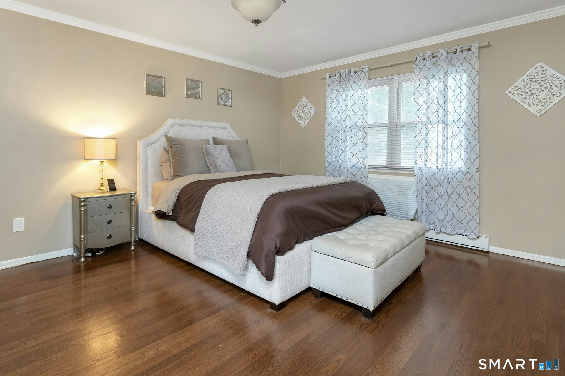 30 Maple Tree Avenue, Unit B Stamford, CT 06906 - Photo 14 of 27 Spacious primary bedroom with hardwood floors