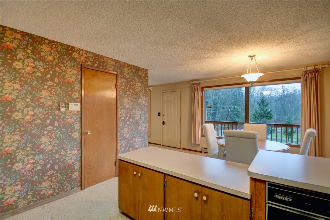 21889 Little Mountain Road Mount Vernon, WA 98274 - Photo 15 of 31 a view of kitchen with furniture and wooden floor