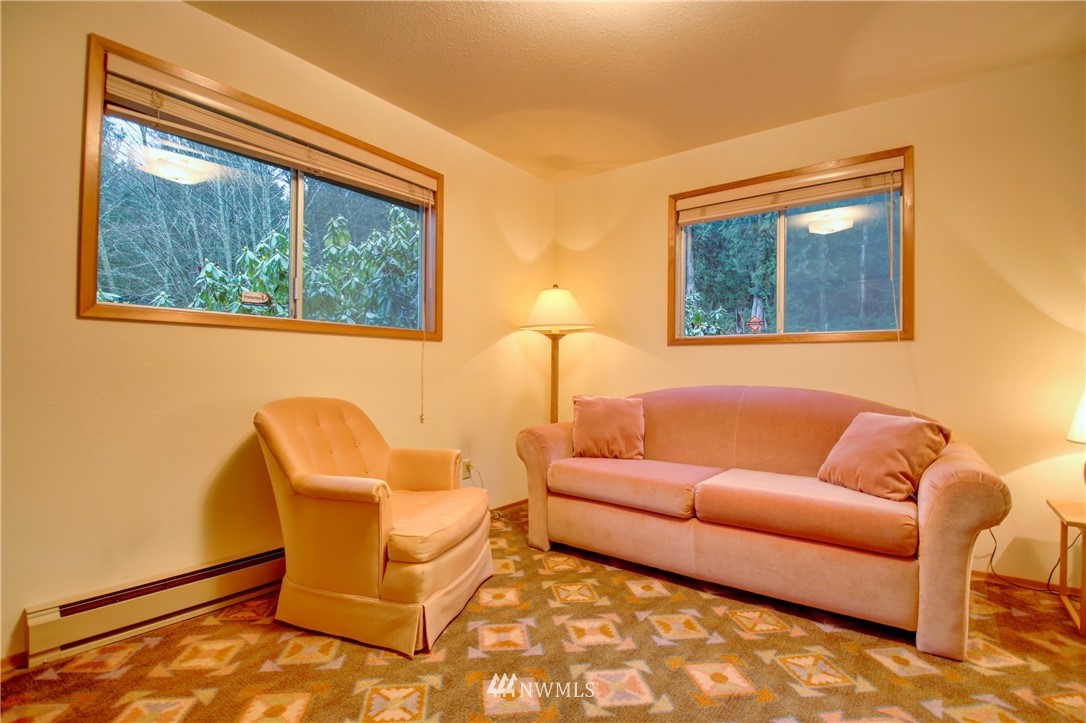 21889 Little Mountain Road Mount Vernon, WA 98274 - Photo 16 of 31 a living room with furniture and a window