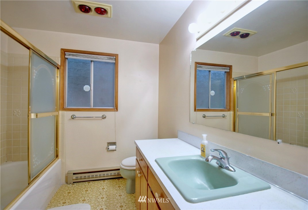 21889 Little Mountain Road Mount Vernon, WA 98274 - Photo 17 of 31 a bathroom with a sink and a mirror