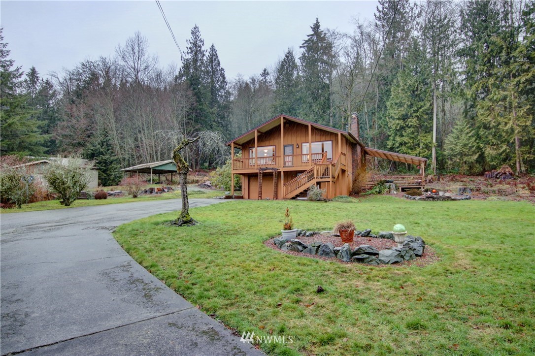 21889 Little Mountain Road Mount Vernon, WA 98274 - Photo 2 of 31 a front view of a house with a yard
