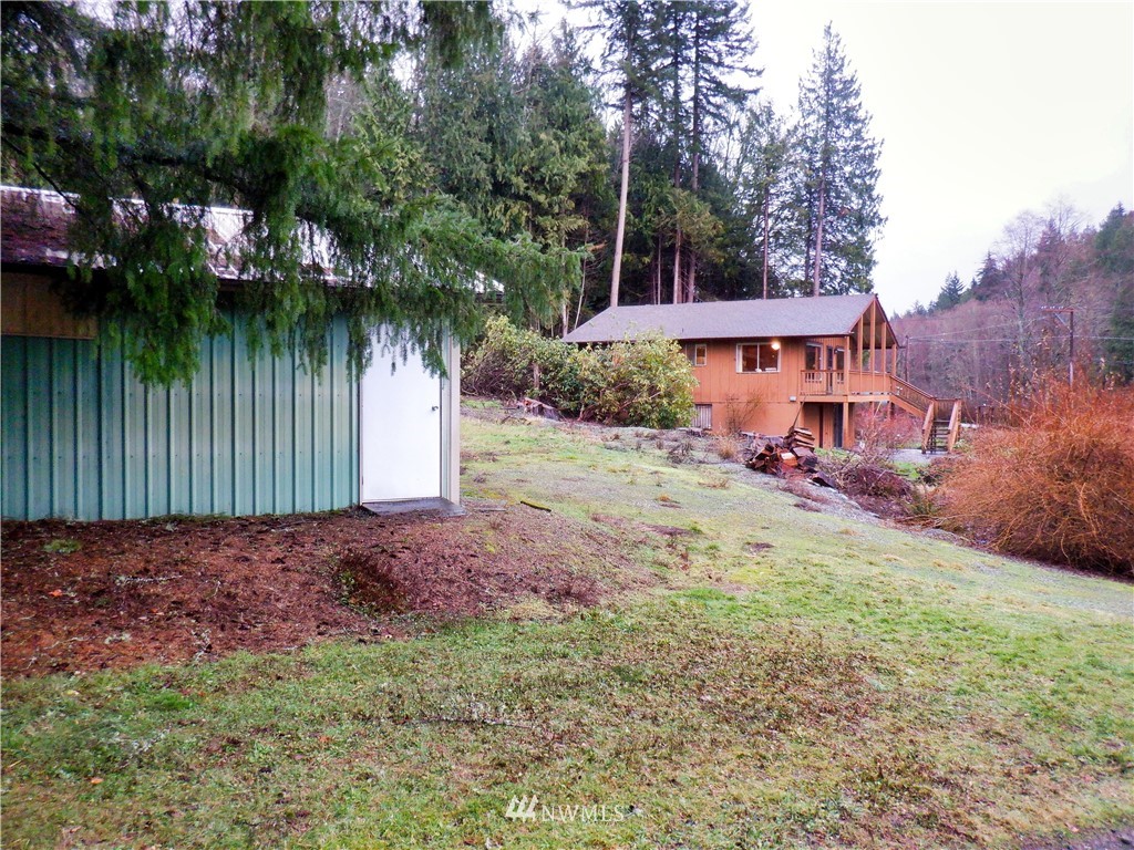 21889 Little Mountain Road Mount Vernon, WA 98274 - Photo 30 of 31 a backyard of a house with lots of green space