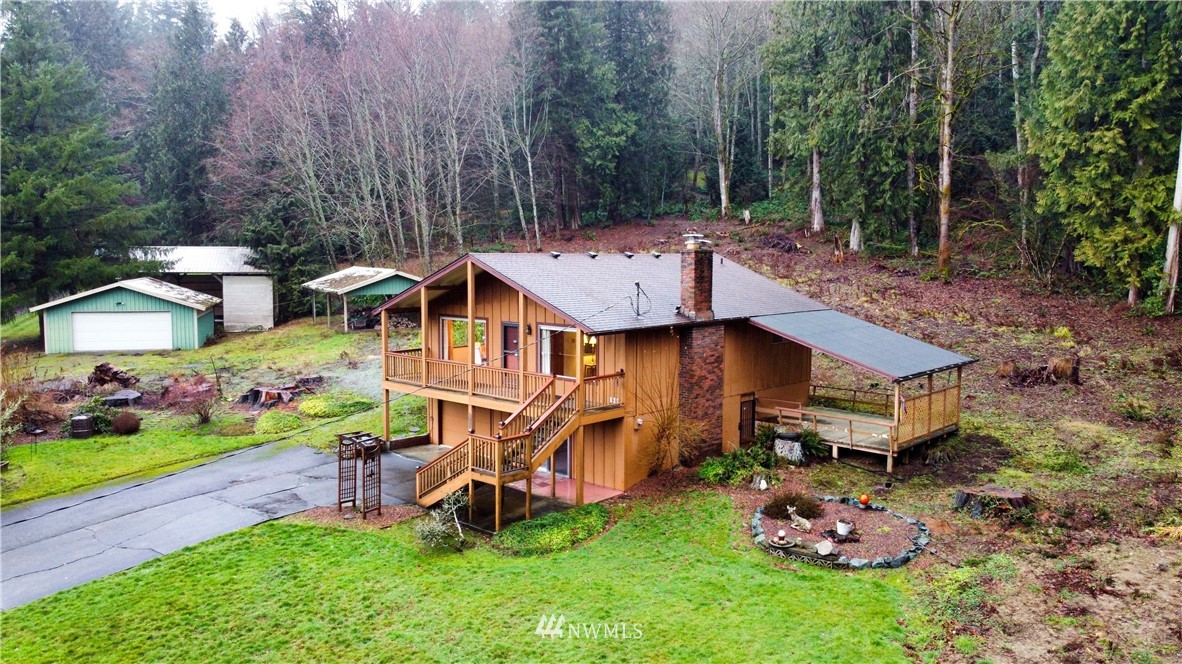 21889 Little Mountain Road Mount Vernon, WA 98274 - Photo 6 of 31 an aerial view of a house with a garden and deck