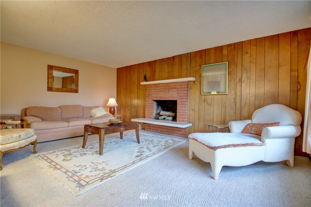 21889 Little Mountain Road Mount Vernon, WA 98274 - Photo 7 of 31 a living room with furniture and a fireplace