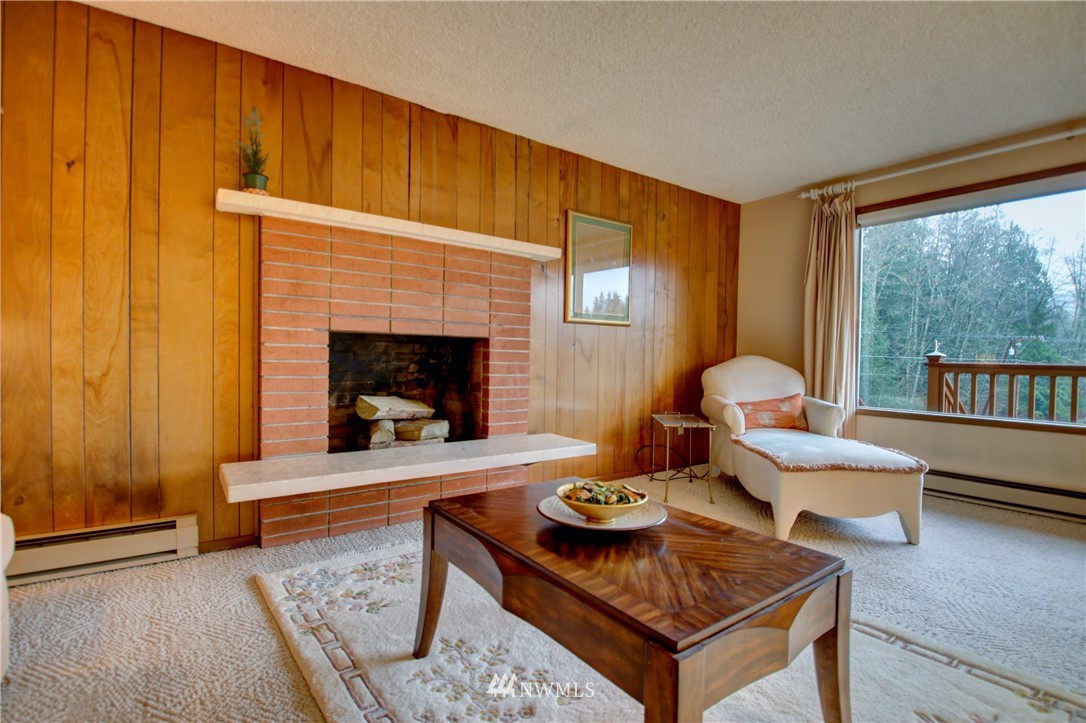 21889 Little Mountain Road Mount Vernon, WA 98274 - Photo 8 of 31 a living room with furniture and a fireplace