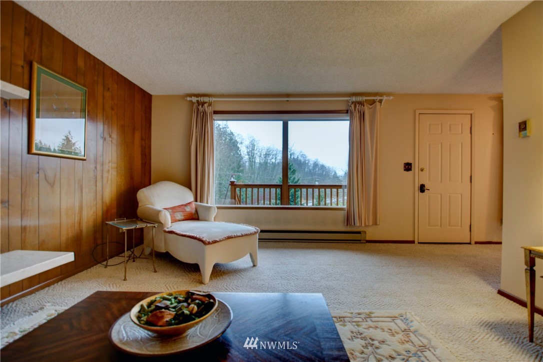 21889 Little Mountain Road Mount Vernon, WA 98274 - Photo 9 of 31 a living room with furniture and a rug