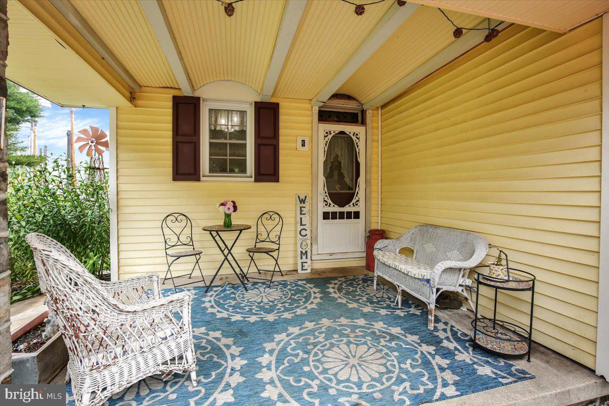 149 Bingaman Road Reading, PA 19606 - Photo 25 of 60 Morning coffee on the back porch. Yes Please!