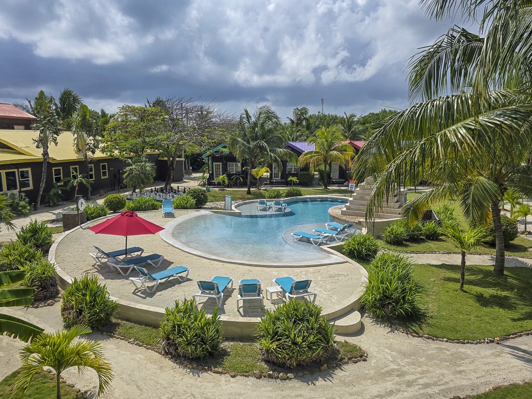 0 X’tan Ha Garden, Unit GV 15 Robstown, TX 78380 - Photo 13 of 22 a view of outdoor space swimming pool and green space