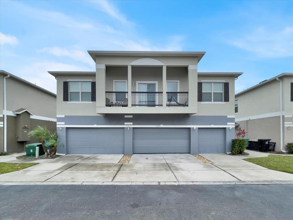 a house view with a backyard