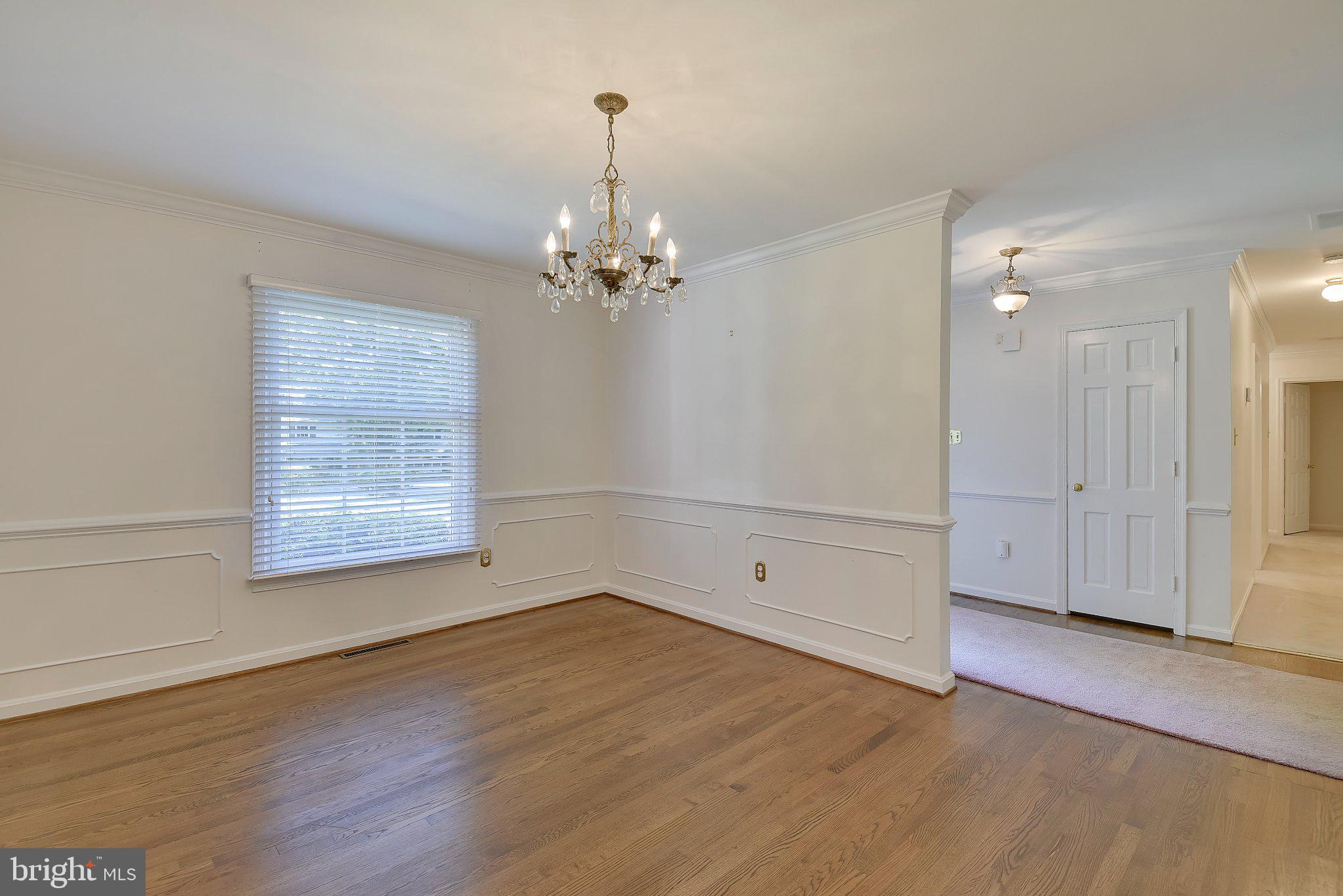 2025 Post Road Vienna, VA 22181 - Photo 7 of 24 Dining Room with Wood Floors
