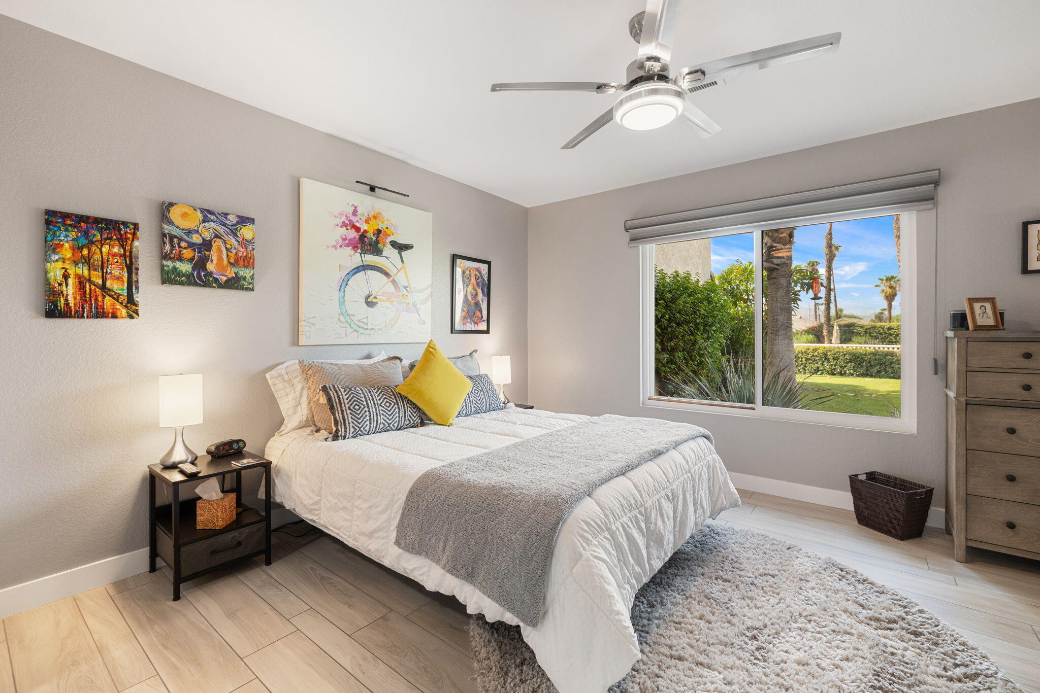 42831 Scirocco Road Palm Desert, CA 92211 - Photo 13 of 32 a bedroom with a bed furniture and a window