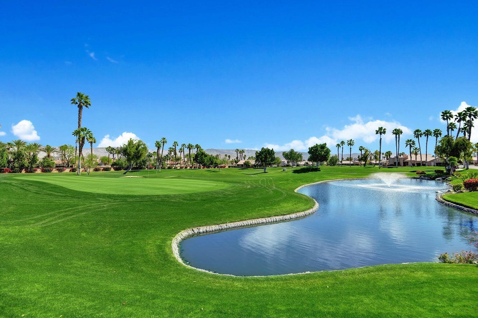 42831 Scirocco Road Palm Desert, CA 92211 - Photo 31 of 32 a view of a house with a big yard