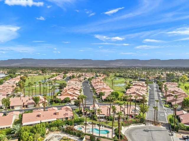 a view of a city with an ocean view