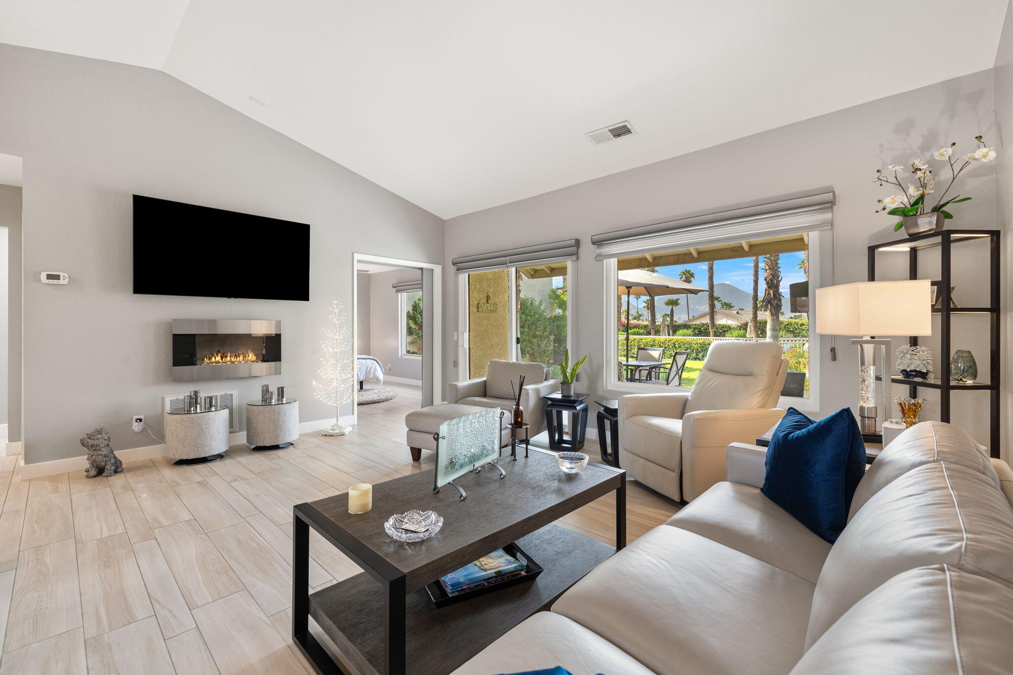 42831 Scirocco Road Palm Desert, CA 92211 - Photo 7 of 32 a living room with furniture and a flat screen tv