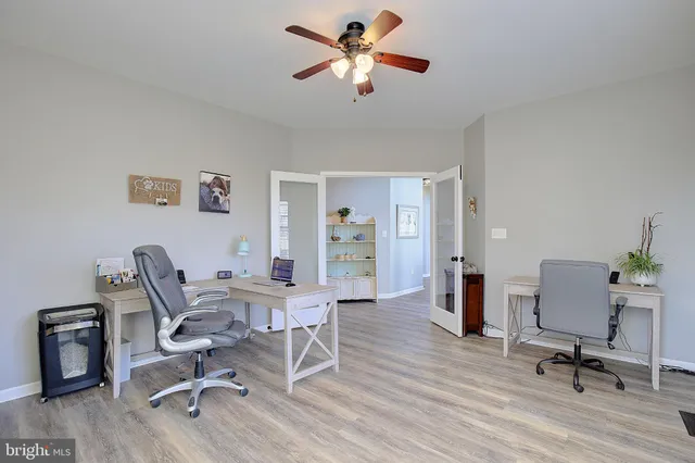 a en suite bathroom with a sink double vanity and a mirror