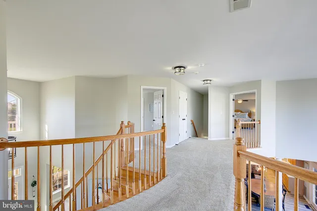 a view of a livingroom with furniture and window