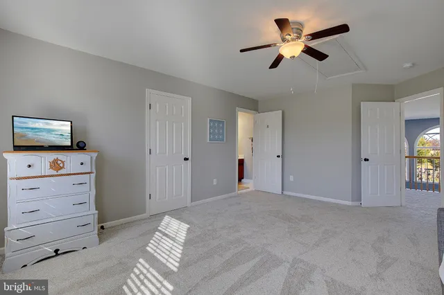 a view of a swimming pool with an ocean view