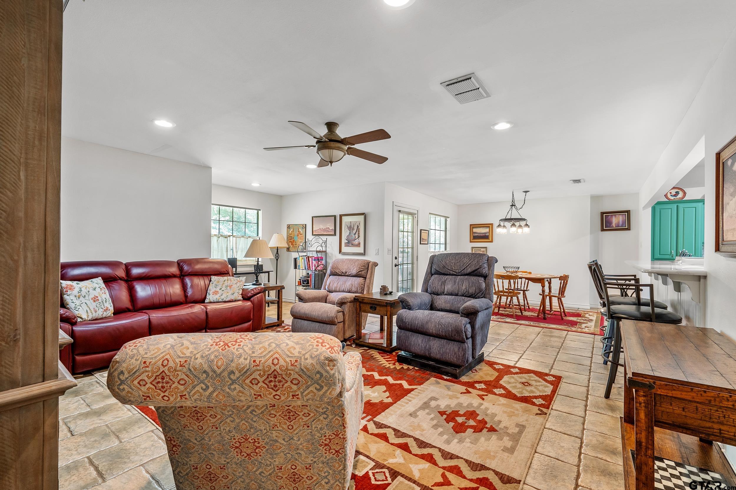 18054 Silver Leaf Flint, TX 75762 - Photo 12 of 30 a living room with furniture and a wooden floor